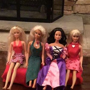 Four Vintage Barbie dolls